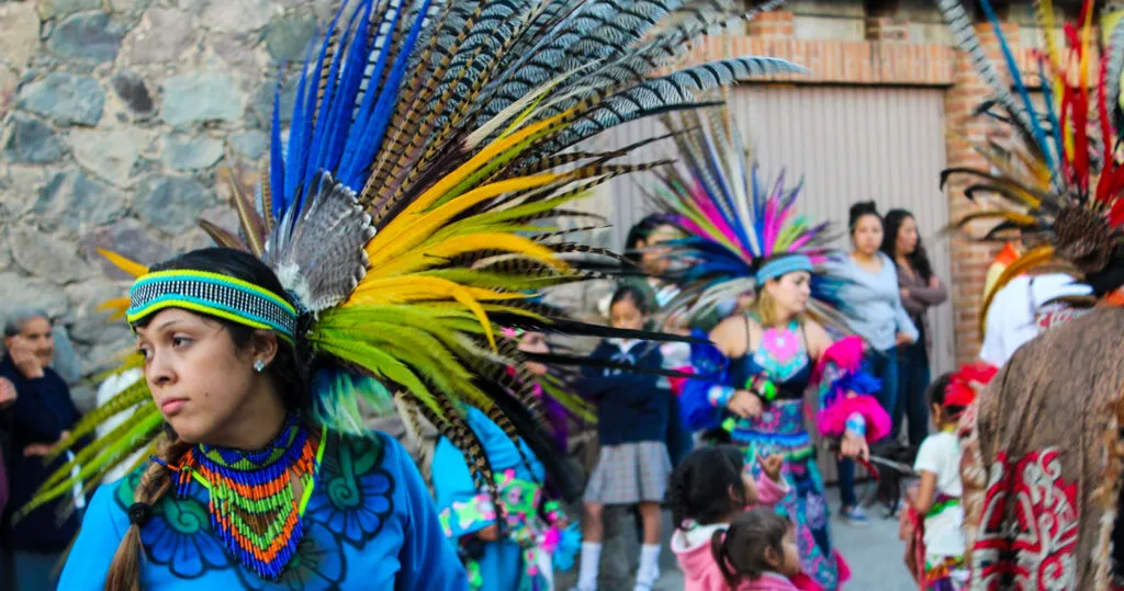 Pre-Hispanic dancer in procession for the day of the Virgin of Guadalupe